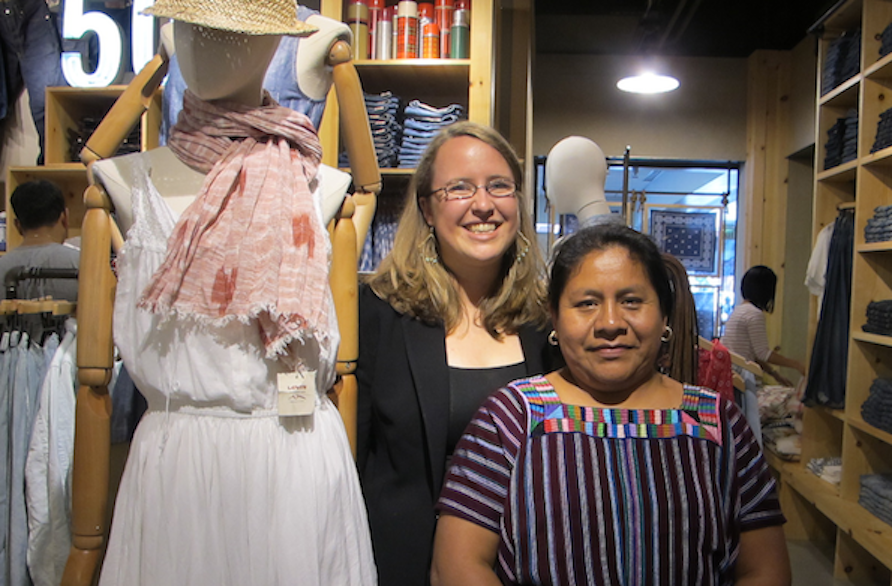At top, Delia on a visit to Levi Strauss & Co.'s San Francisco headquarters. Above, Delia and Mercado Global Executive Director Ruth DeGolia at the Levi's Plaza Store in San Francisco, shown next to a Mercado Global scarf.