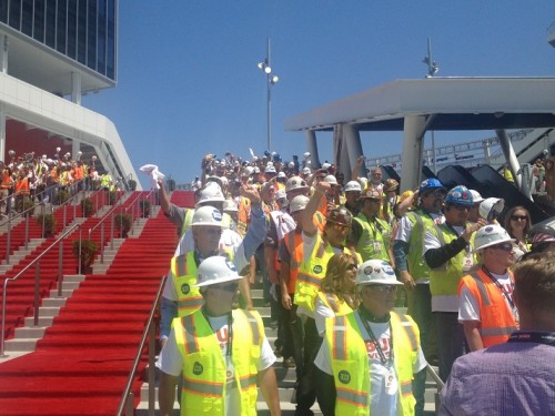 construction workers ribbon cutting