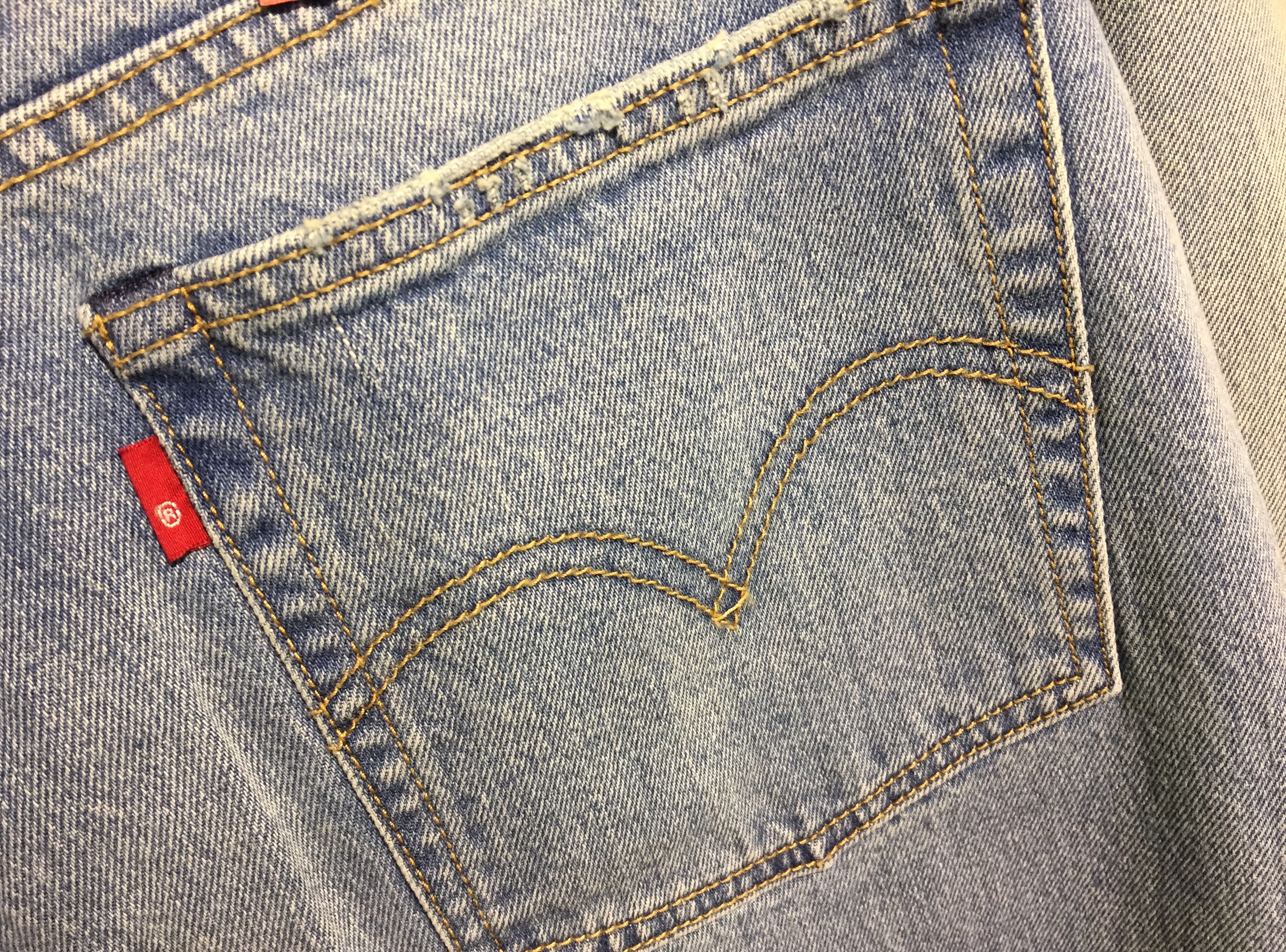 levi jeans with red stitching