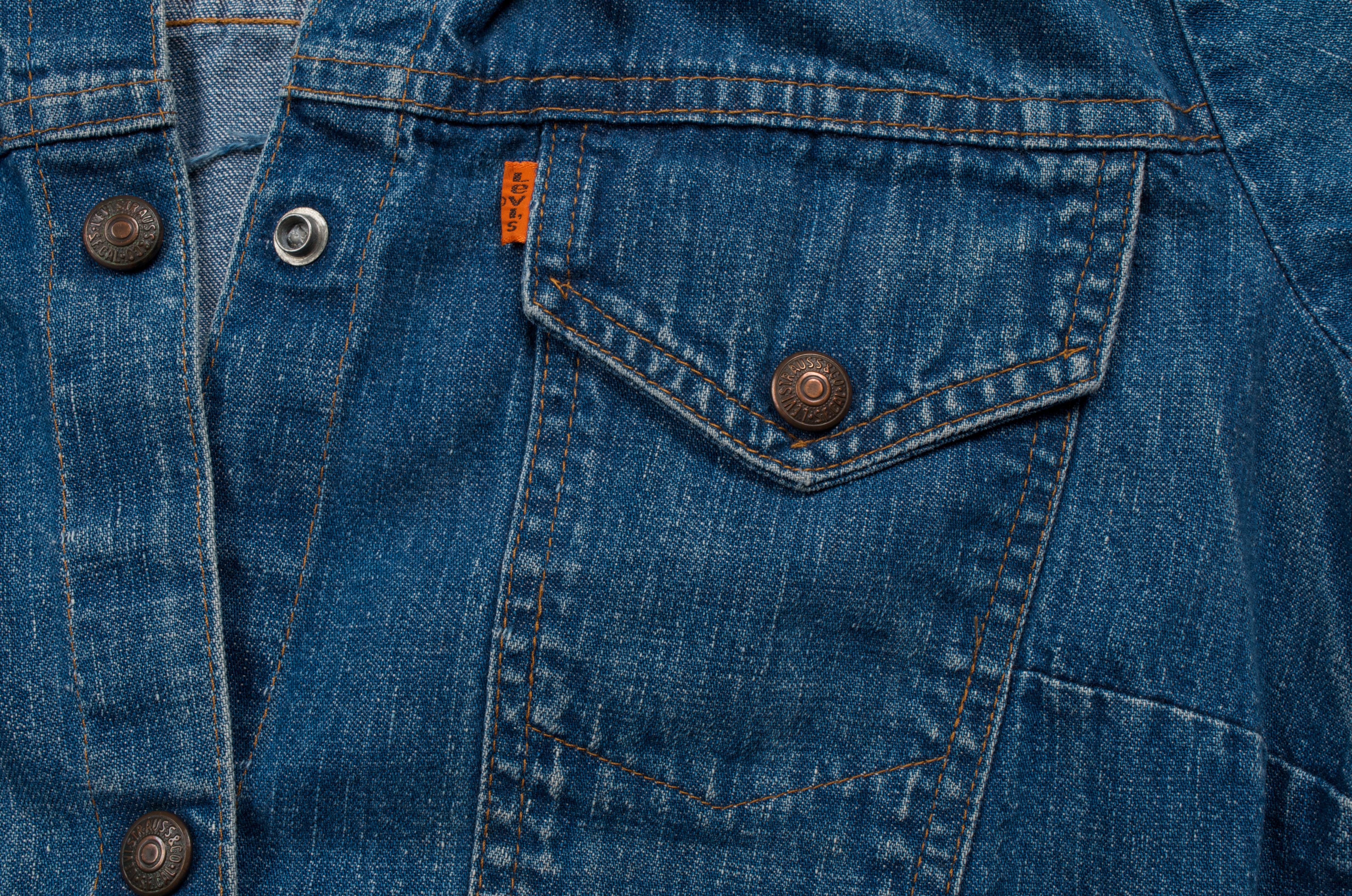 A close up of a front pocket on a Levi's® denim jacket. 