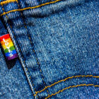 Close-up photo of the Levi's® Pride tag on the back pocket of a pair of jeans.