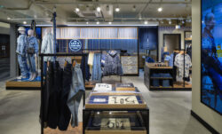 The interior of the Levi's® Kyoto store, featuring mannequins dressed in denim outfits and racks of Levi's® products. 