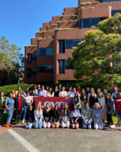 A group of LS&Co. interns pose in front of LS&Co. San Francisco headquarters