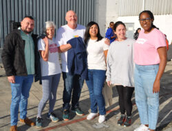 Red Tab Foundation Case Manager Lavinia Crawford-Browne poses with LS&Co. employees South Africa on the annual (Run) for Red Tab