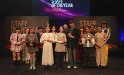 A group photo on stage at STAFF START’s STAFF OF THE YEAR competition