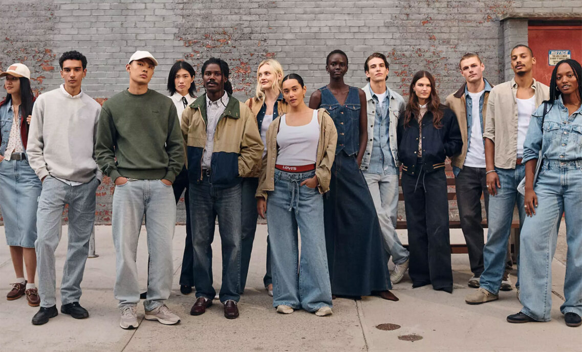 A group of 13 models pose wearing Levi's products